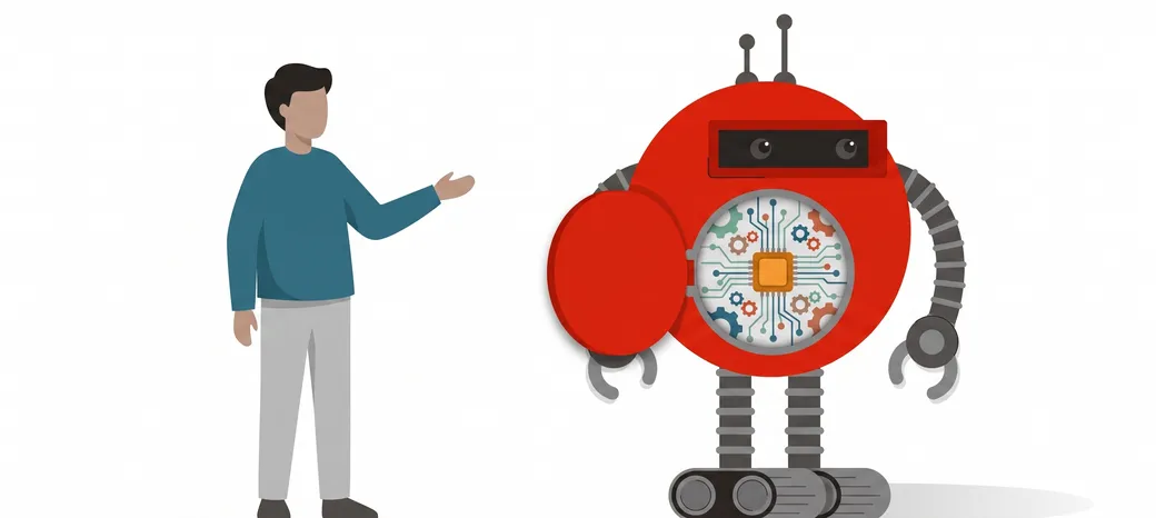 A trainer beside the Kapernikov robot, its belly panel open to show the mechanism inside